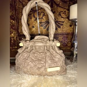 Louis Vuitton Olympe Stratus
Handbag Limited Edition monogram lambskin pm